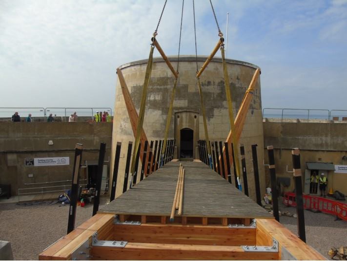 The new entrance bridge being crane-lifted into position at Martello Tower No. 74